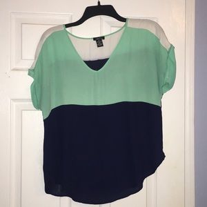 White, green and navy blouse